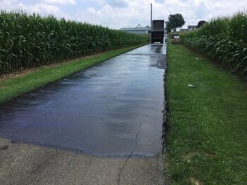 Seal coating roads and driveways